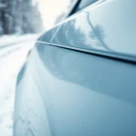 PPF winter road salt protection visualizes a car's outer shield against winter elements.